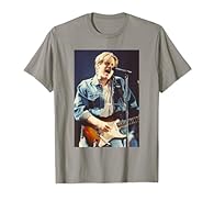 Relive some of the most visually striking moments of music, cinematic and sporting history with our range of Iconic Photo Moments clothing! All images are the copyright of and property of the Mirrorpix Photographic Library. Iconic Photo Moments merch...