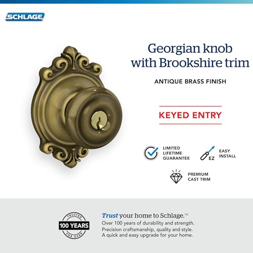 Image of SCHLAGE F51A GEO 609 BRK Georgian Knob with Brookshire Trim Keyed Entry Lock, Antique Brass