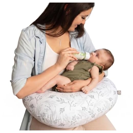 Boppy Nursing Pillow - Firm, Ergonomic U-Shaped Bottle and Breastfeeding Pillow with High Lift for Comfort and Support, Spacious Surface - Gray Gentle Leaves