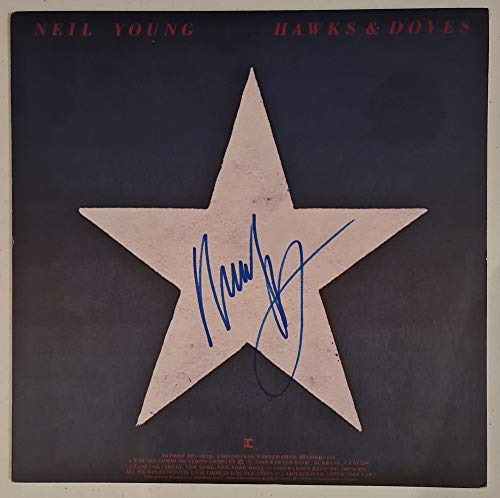Collect Authentic Neil Young Autographed 'Hawks & Doves' Album COA #NY63552