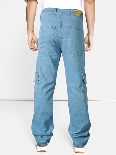 Image of RIG BONE Men's Relaxed Fit Cargo Jeans with Functional Pockets Comfortable High Rise Design Durable Denim Mid Wash Ideal for Casual Wear Travel Outdoor and Urban Adventures