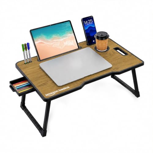 Image of Amazon Basics Engineered Wood Foldable Laptop Table with Cup and Pen Holder, Tablet and Mobile Phone Groove | Mini Drawer, Use for Writing, Bed, Breakfast (60L x 40W x 25H cm, Brown)
