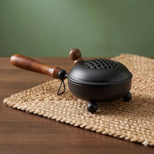 Image of Amazon Brand - Solimo Dhoop Dani with Handle (11.4 cm / 4.4 Inch) | Incense & Loban Burner Dhuni Stand | Durable Iron Body with Black Finish | Round Design | Safe Grip Handle | Ideal for Home, Office & Temple Pooja