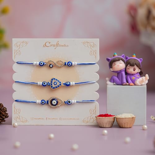 Image of eCraftIndia Evil Eye Rakhi Set of 3 for Brother with Cute Couple Showpiece | Designer Nazar Rakhi Combo | Premium Beaded Rakhi Gift Set for Bhai | Raksha Bandhan Gift