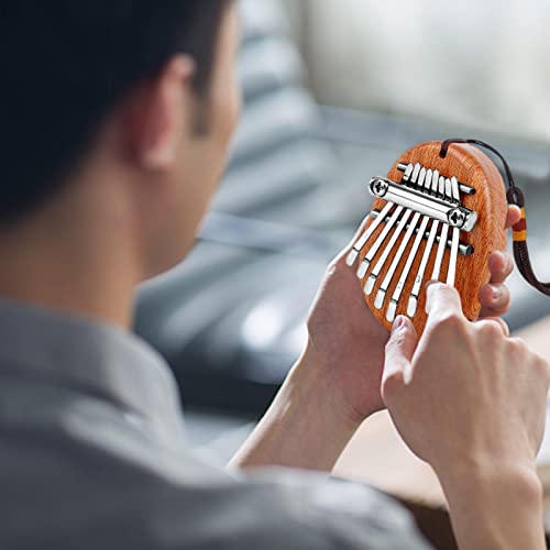 Mini Kalimba 8 touches, piano à pouce pour débutant, Kalimba instrument, Kalimba enfants avec lanière de transport… - Les Beatles, Paul McCartney, John Lennon, RIngo Starr, George Harrison Mini Kalimba 8 touches, piano à pouce pour débutant, Kalimba instrument, Kalimba enfants avec lanière de transport… – Image 5