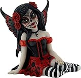 santa muerte estatua roja De la colección de calaveras de azúcar.