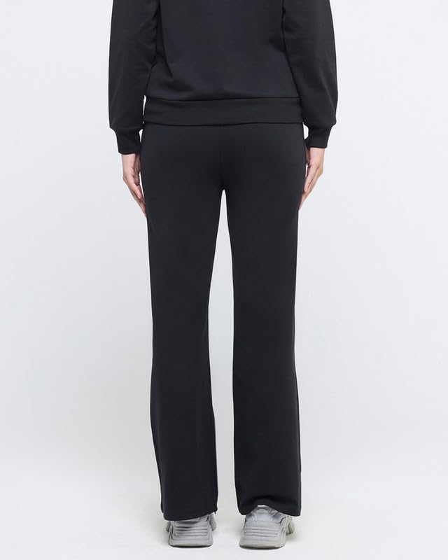 Image of HUNNIT Essential Flare Pants for Women with Zip Pockets | Mid Waist Solid Cotton Tapered Flare Pants | Bootcut Flared Trousers with Wide Elastic Waistband | Relaxed Fit Flared Trouser