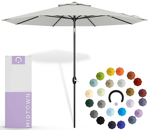 Image of Midtown Umbrellas - 10-Year-No-Fade 9 Ft Patio Umbrella with Terylast Fabric, Auto-Tilt Aluminum Frame and 8 Reinforced Ribs for Deck, Pool, Garden & Beach - Off White Canopy, Black Pole