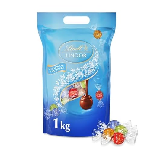Lindt Schokolade LINDOR Kugeln Vollmilch Mischung | 1 KG Beutel, wiederverschließbar | ca. 80 Kugeln in 4 Sorten (Milch, Pistazie, Milchcrème, Caramel) | Großpackung | Schokoladengeschenk