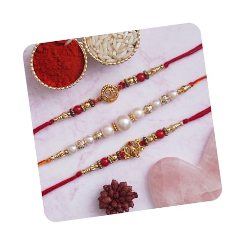 Image of eCraftIndia Red & Golden Set of 3 Trishul with Damru, Lord Ganesha, & Lord Krishna Playing Flute Religious Rakhis with Roli Chawal Pack