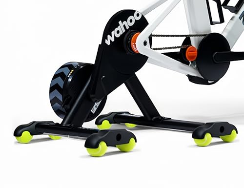 Pieds à bascule Wahoo KICKR CORE avec 8 balles de tennis pour un pédalage silencieux et stable