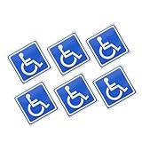 Behindertenbeschilderung für autos: das design verfügt über das rollstuhlsymbol und ist leicht zu erkennen. parkschild für behinderte