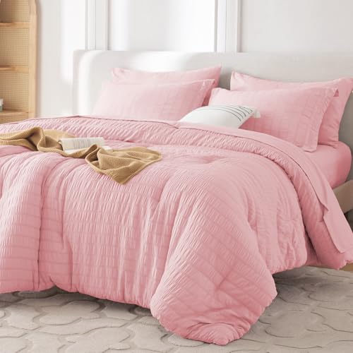 Image of MUXHOMO 7 Pieces Oversized King Comforter Set, Seersucker Bed in a Bag Oversized King Size, All Season Luxury Bedding Set with Comforter, Flat Sheet, Fitted Sheet, Pillowcases & Shams, Pink