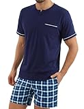 Haut de Pyjama à Manches Courtes : Le haut pyjama col V avec ses fines rayures aux manches offre une tenue décontractée élégante. Sa poche poitrine pratique garde vos petits essentiels à portée de main. Idéal pour les matins détente ou porté comme sous-vêtement décontracté, c'est un basique confortable pour vos journées à la maison