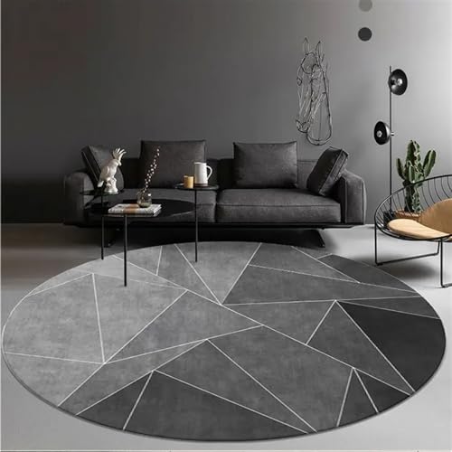 Tapis rond géométrique dans la chambre sous le bureau