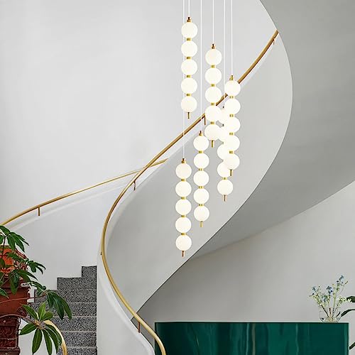 Luces colgantes largas para techos altos y escaleras de diseño lineal 2