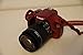 Produktbild Canon EOS 1100D + EF-S 18-55 mm SLR-Kamera-Set, 12,2 MP, CMOS 4272 x 2848 Pixel, Rot  Digitalkameras (12,2 MP, 4272 x 2848 Pixel, CMOS, HD, Rot)