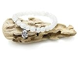 Bracelet de fabrication artisanal en pierre de lune naturelle - Monté sur fils élastique. Travail très soigné.