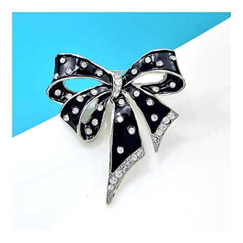 Broche en émail noir accessoire idéal pour tenue de fête