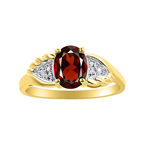 Bague grenat et diamant en or jaune aux ailes majestueuses de haute joaillerie