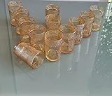 Juego de 12 vasos de té marroquí para disfrutar del té de un tipo especial.