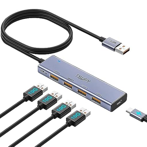 TSUPY Hub USB 3.2, Hub USB 5 Puertos Aluminio Adaptador para Transmisión Rápida Datos, Cable 1,2m Largo, 4 * 3.2 USB Splitter Concentrador 1 * Tipo C Carga, Compatible con PC, Macbook Air, iMac, iPad | Ya disponible en tu tienda friki favorita! En mundofriki.es! TSUPY Hub USB 3.2, Hub USB 5 Puertos Aluminio Adaptador para Transmisión Rápida Datos, Cable 1,2m Largo, 4 * 3.2 USB Splitter Concentrador 1 * Tipo C Carga, Compatible con PC, Macbook Air, iMac, iPad | Ya disponible en tu tienda friki favorita! En mundofriki.es!