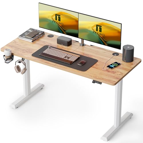 Image of FEZIBO Height Adjustable Electric Standing Desk, 55 x 24 Inches Stand up Table, Sit Stand Home Office Desk with Splice Board, Light Rusticbrown