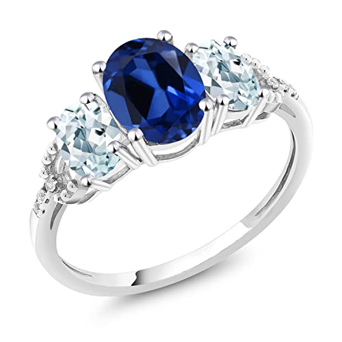 Gem Stone King 10K White Gold Blue Created Sapphire Sky Blue Aquamarine and Diamond Accent 3-Stone Engagement Ring | 2.51 Cttw | 3 Stone Wedding Anniversary Promise Ring For Women