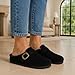 CUSHIONAIRE Haven Genuine Leather Clogs for Women – Faux Fur Lined Slip-On Womens Shoes with Cork Footbed and Adjustable Buckle, Black 9