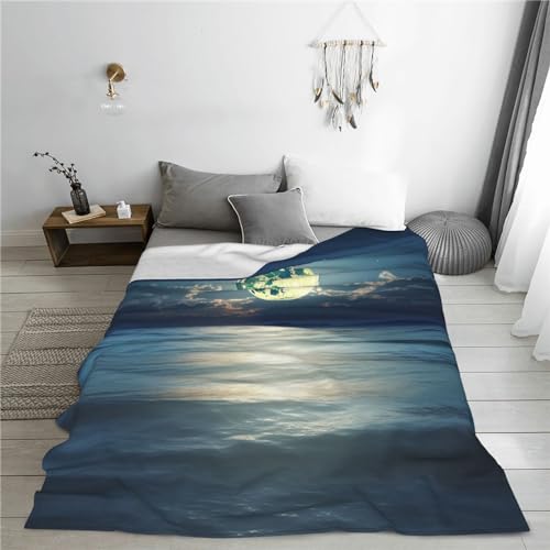 Couverture lune et mer en micro polaire légère et design d'exception
