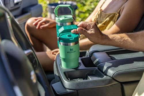 Image of Stanley IceFlow Flip Straw Tumbler with Handle 20 oz | Twist On Lid and Flip Up Straw | Leak Resistant Water Bottle | Insulated Stainless Steel |BPA-Free | Jade