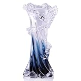 Capture l'essence de la côte : le design élégant des vagues et le dégradé fascinant du bleu profond au cristal capturent parfaitement le mouvement fluide de l'océan. Ce vase apporte instantanément une ambiance sereine et côtière à n'importe quel espace, ce qui en fait une pierre angulaire pour la décoration intérieure sur le thème de la plage ou nautique.