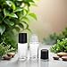 Juroicessry 2Pcs Black 30ML Clear Empty Glass Essential Oil Roller Bottles Vials Containers Refillable Roll-on Bottle,Refillable Cosmetic Containers Refillable,Roller Bottles,Tools and Accessories