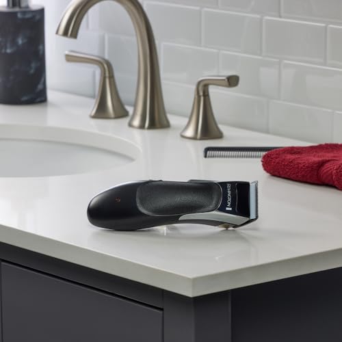 Foto von Remington Haarschneidemaschine Profi [selbstschärf. Keramik Klingen mit Einstellhebel/0,5-25mm] Haarschneider Set (8 Aufsteckkämme, Netz-/Akkubetrieb, Lithium, Profi-Koffer mit Friseur Zubehör) HC363C