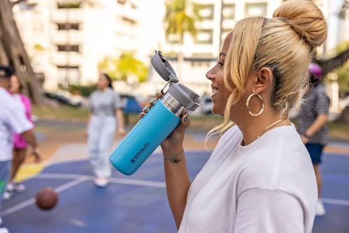 Image of Stanley Quick Flip GO Water Bottle 24 oz | Push Button Lid | Leakproof and Packable for Travel and Sports | Insulated Stainless Steel | BPA-Free | Pool