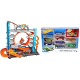 hot wheels mega garage video ESTE GRAN SET DE GARAJE tiene más de 90 plazas para coches Hot Wheels (se venden por separado), un gigantesco looping de 2 carriles y un tiburón que ataca por sorpresa para dar emoción a las carreras.