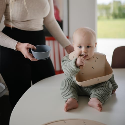 Image of mushie Silicone Baby Bib | Adjustable Fit Waterproof Bibs (Bees)