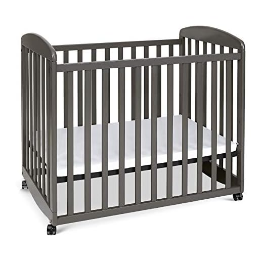 Davinci Alpha Mini Rocking Crib in Slate, Removable Wheels, Greenguard Gold Certified