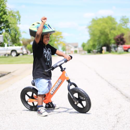 Image of Strider 12 Sport Bike, Orange - No Pedal Balance Bicycle for Kids 1 to 4 Years - Includes Safety Pad, Padded Seat, Mini Grips, Flat-Free Tires -Easy Assembly, Tool-Free Adjustments