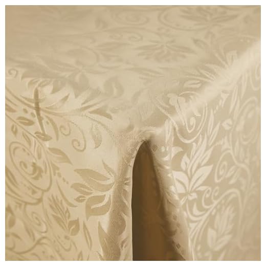 Comart - Tovaglia Jacquard Natalizia - Antimacchia - Copritavolo per le Feste - in Poliestere Damascato - Resistente ai liquidi - Lavabile in Lavatrice - Rettangolare 140x180 cm - 6 Posti - Dorata