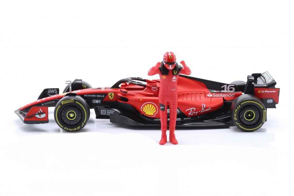 Burago - Auto da collezione Formula 1, compatibile con Ferrari SF23 con statuetta Charles Leclerc 2023 1/24 in metallo