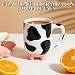 Imagen de Demlaka Taza de café de vaca de 550 ml: taza de cerámica con cuchara de acero inoxidable