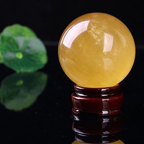Boule de cristal jaune calcite spath d'Islande 120mm pour pierre de soin