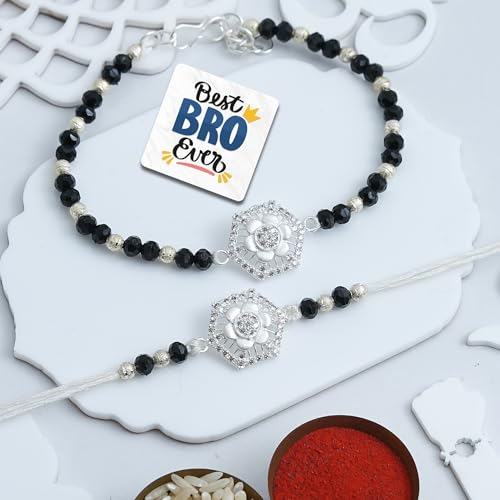 Image of eCraftIndia Silver Black Flower Designer Bhaiya Bhabhi Rakhis with Best Bro Ever Fridge Magnet | Set of 2 Rakhi for Brother and Bhabhi | Lumba Rakhi | Roli Chawal Pack