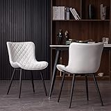 Silla de comedor moderna de metal tapizada.