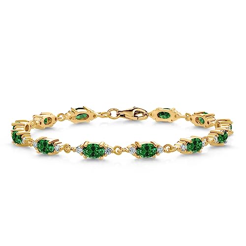 Gem Stone King 18K Yellow Gold Plated Silver Green Created Emerald and White Moissanite Tennis Bracelet For Women (5.11 Cttw, Gemstone Birthstone, Oval 6X4MM, 6.5 Inch)