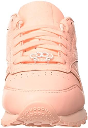 peach reebok trainers