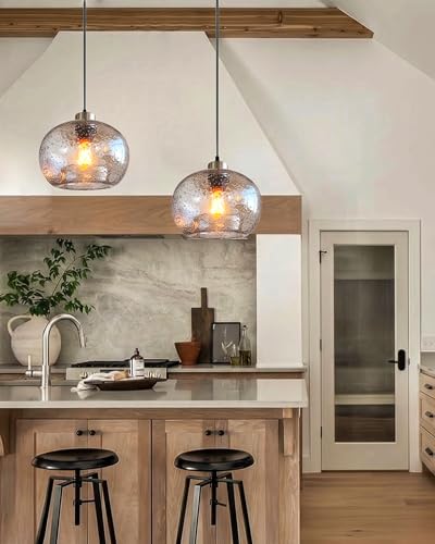 Image of CASAMOTION Hand Blown Clear Glass Pendant Lights with Black Marble, Modern Rustic Kitchen Island Ceiling Hanging Light Fixtures for Dining Room Table Bedroom, Oval Globe 8.7 Inch Diameter, 2 Pack