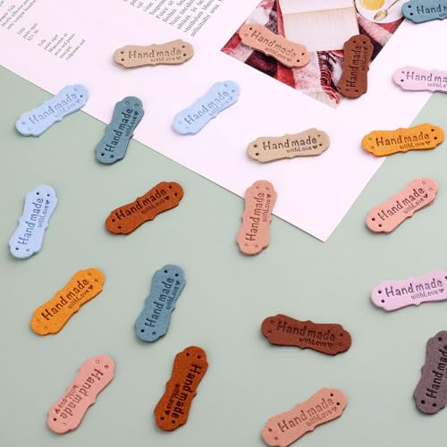 Image of SAVITA 50pcs Handmade Leather Labels, Microfiber Colorful Leather Labels with Love Hearts Handmade Embossed Crochet Tags with Holes for Crafts Knitting Sewing Hats Purses Clothing (10 Colors)
