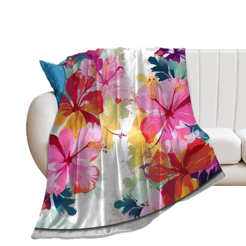 Couverture à imprimé floral hawaïen contre le froid hivernal sur le lit